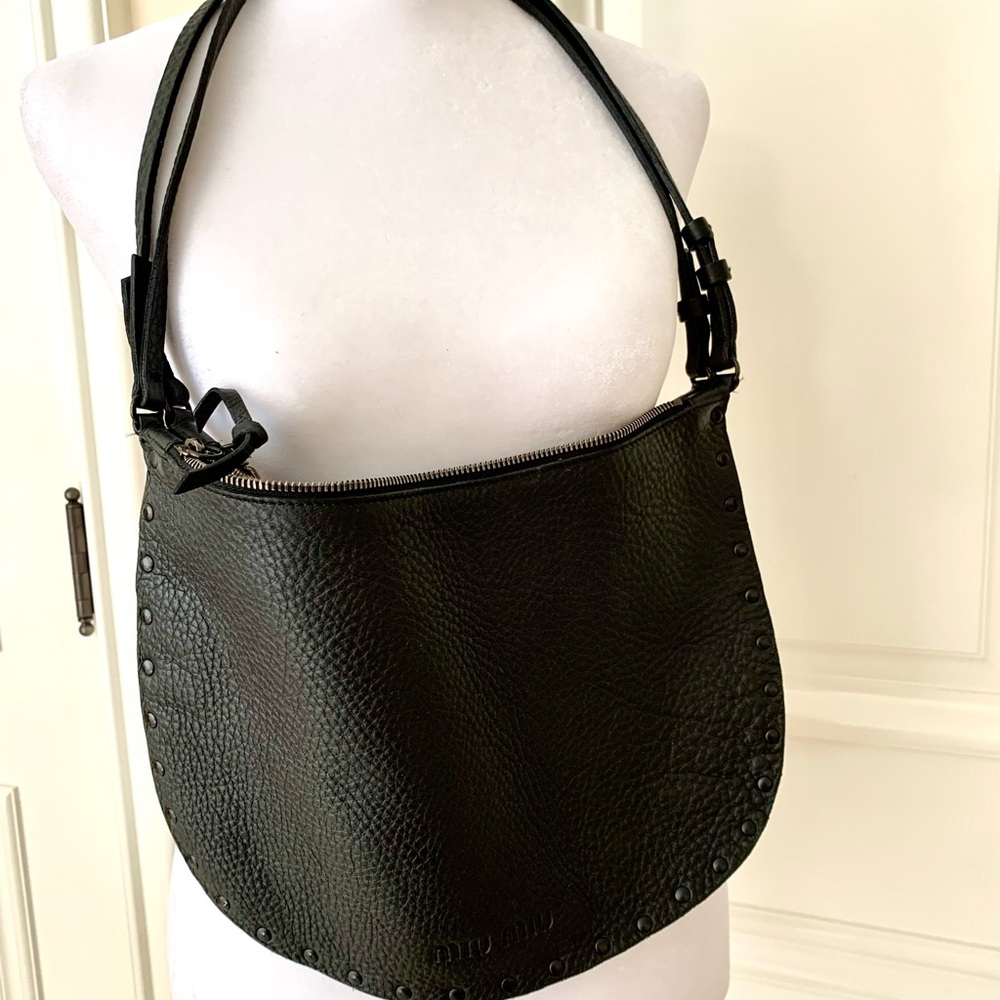 Miu Miu  Black pebble leather saddle like bag. Rare